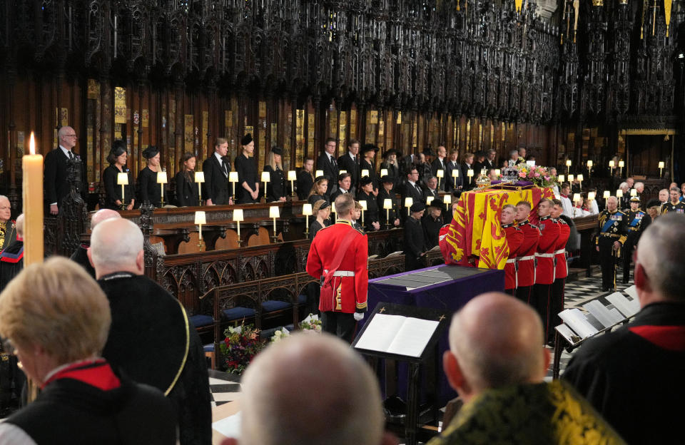 The Bearer Party take the coffin of Queen Elizabeth II, from into St George's Chapel inside Windsor Castle on September 19, 2022, for the Committal Service for Britain's Queen Elizabeth II. (Photo by Jonathan Brady / POOL / AFP) (Photo by JONATHAN BRADY/POOL/AFP via Getty Images)