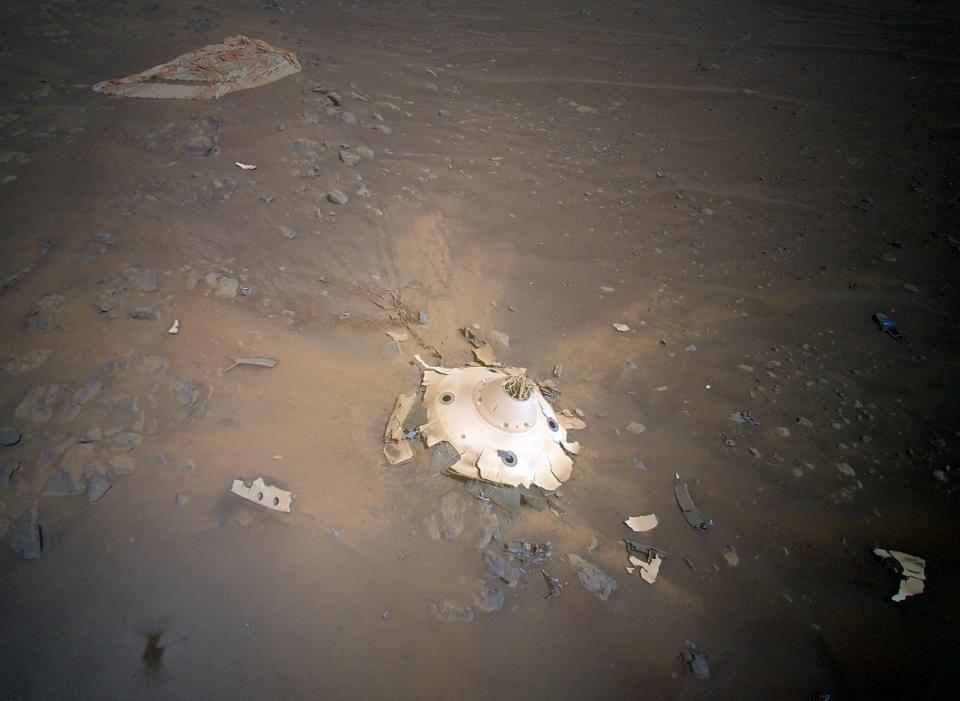 <div class="inline-image__caption"><p>Perseverance’s backshell sitting upright on the surface of Jezero Crater. Humans have generated nearly 16,000 pounds of trash on Mars in the past 50 years alone. </p></div> <div class="inline-image__credit">NASA/JPL-Cal Tech</div>