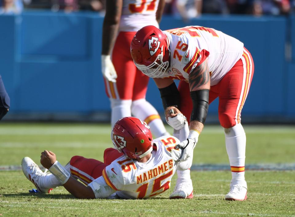 Chiefs quarterback Patrick Mahomes was helped up by guard Mike Remmers after an ugly sack in the fourth quarter.