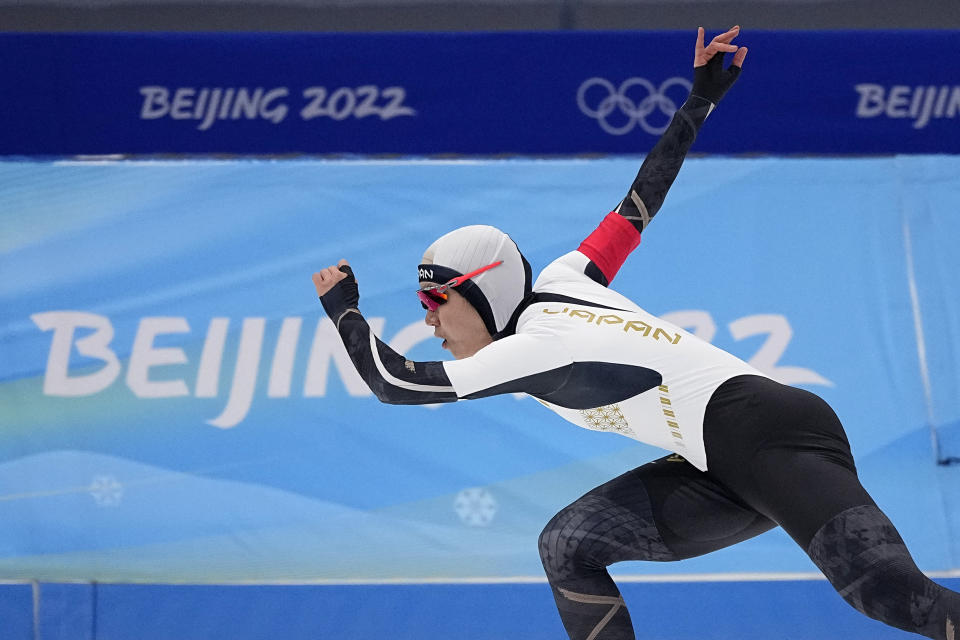 Miho Takagi of Japan competes in the speedskating women's 500-meter race at the 2022 Winter Olympics, Sunday, Feb. 13, 2022, in Beijing. (AP Photo/Sue Ogrocki)