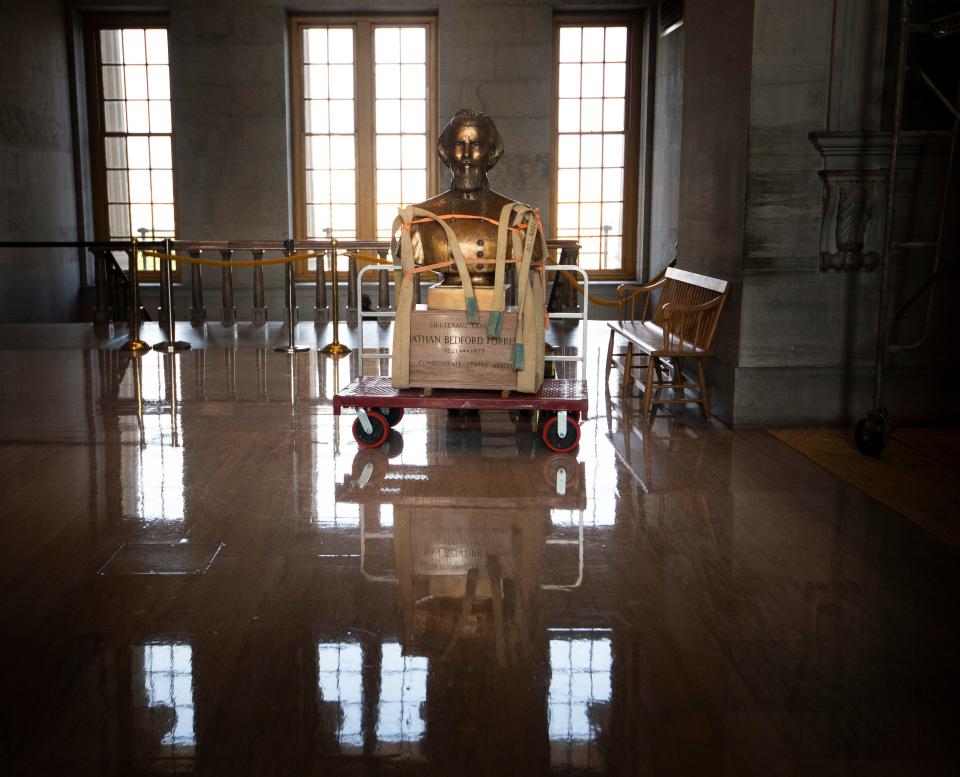 The Nathan Bedford Forrest bust is removed from the State Capitol Friday, July 23, 2021 in Nashville, Tenn.