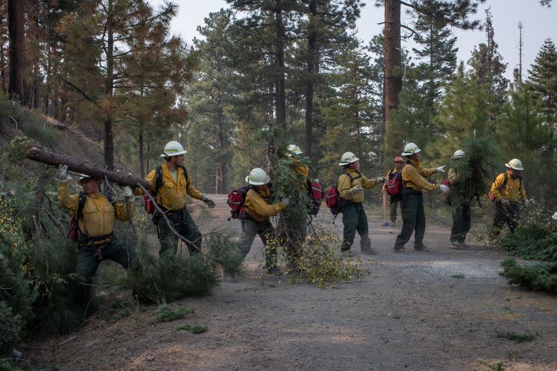 Firefighters from Mexico and Honduras prep fire line ahead of Brattain Fire in Paisley, Oregon