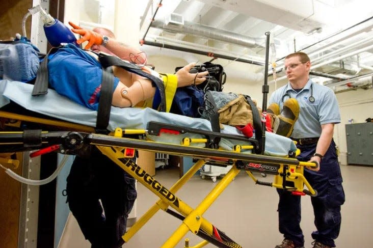 KCC students train  to become EMTs in the lab at the Battle Creek facility.