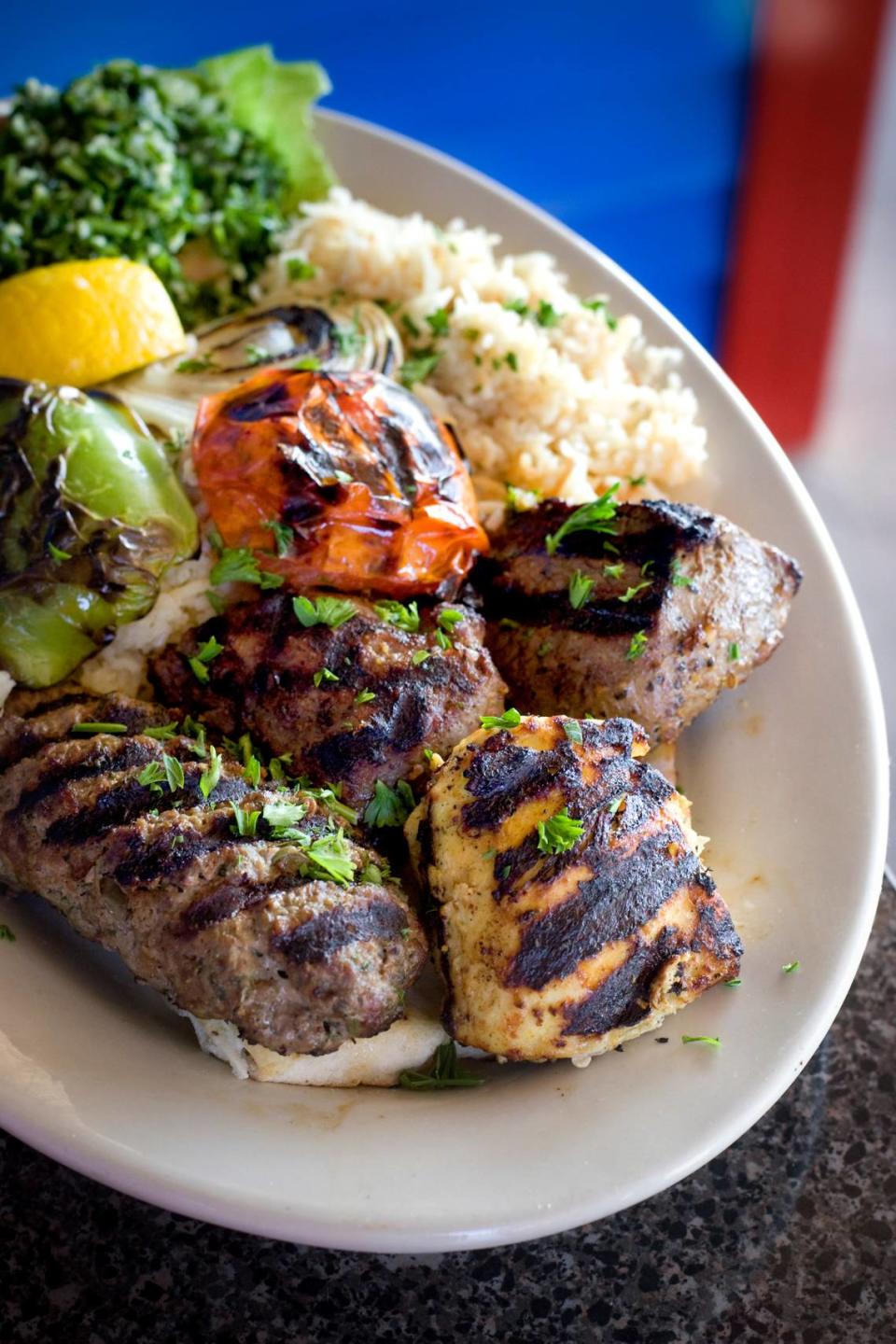 The Prince Lebanese special, includes an assortment of lamb, beef. shish tawook, kebabs and tabbouleh at Prince Lebanese Grill.