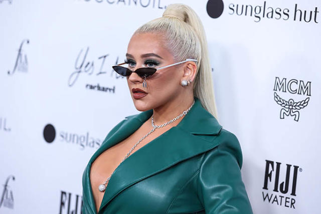 Christina Aguilera Brings Green Glamour to the Red Carpet in Plunging  Leather Dress & Sparkling Mesh Heels at The Daily Front Row Fashion Awards