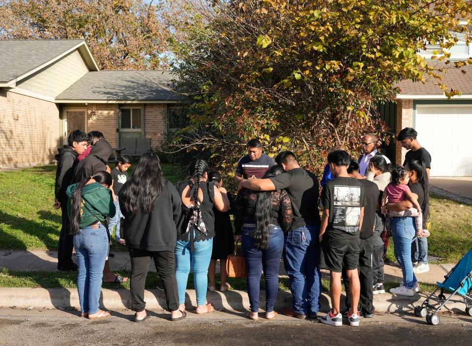 Relatives of a man who was fatally shot Tuesday mourn at the site on Shadywood Drive in South Austin on Wednesday.