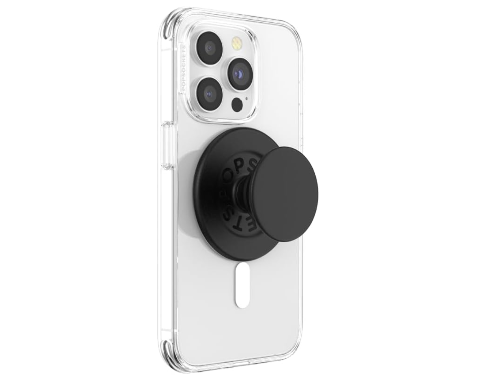 white phone with black popsocket