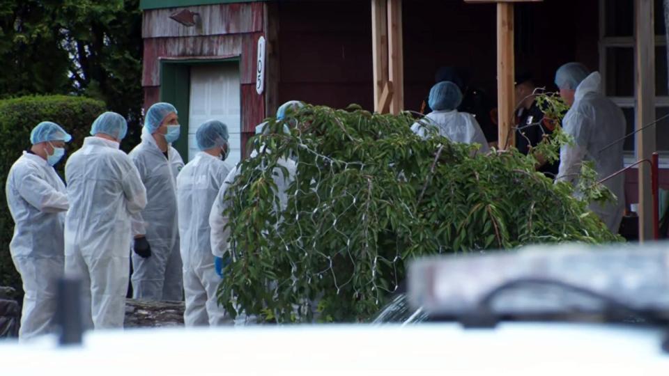 <div>Law enforcement on the scene of a home in Massapequa Park, connected to the Gilgo Beach murders investigation.</div>