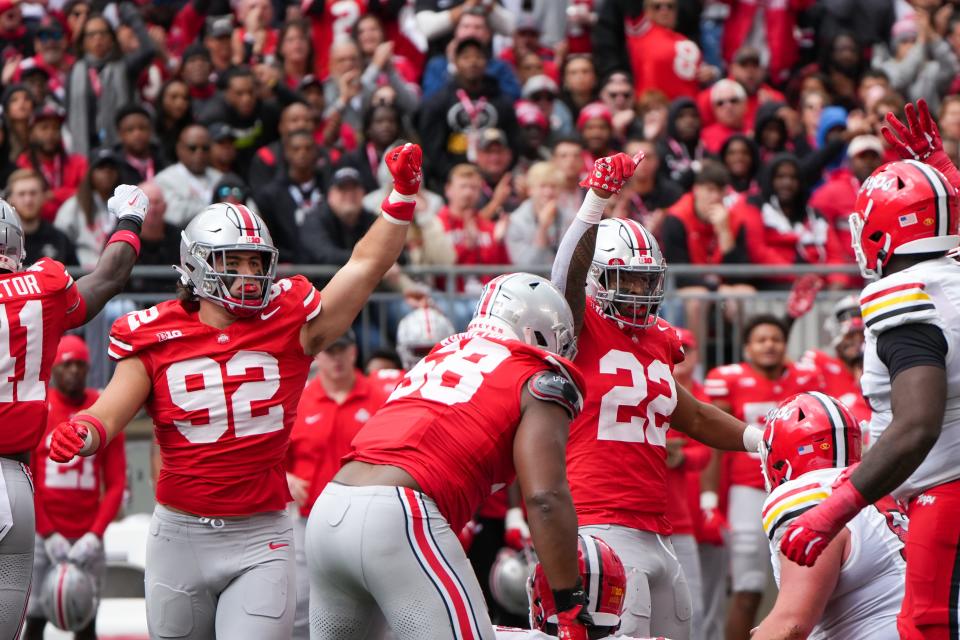 Ohio State players react to a defensive stop against Maryland on Saturday.