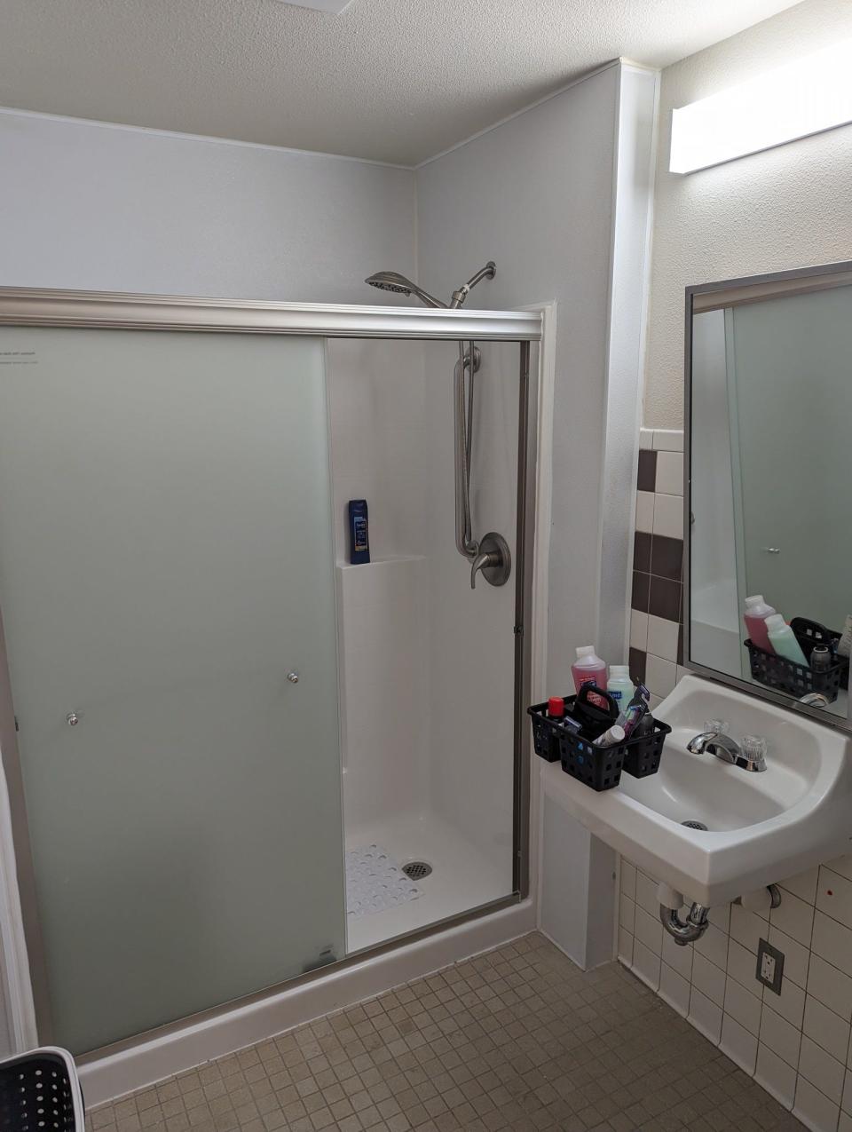 A shower where homeless students are allowed to shower at the Tiger Care Center. The Care Center is for students who need a little help with clothing, toiletries, food and APS has a social worker on-site to help with the Medicaid application process.