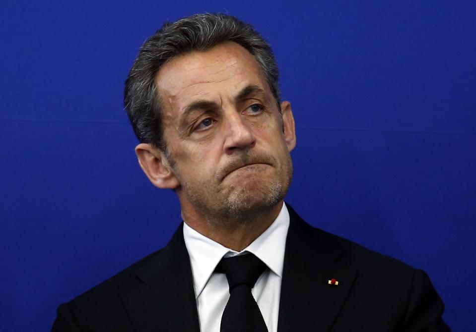 Former French President Nicolas Sarkozy attends the inauguration of the Institut Claude Pompidou, a new centre for care and research of Alzheimer disease, in Nice in this March 10, 2014 file photo. Sarkozy was held on July 1, 2014 for questioning into suspicions that a network of informers kept him abreast of a separate inquiry into alleged irregularities in his 2007 election campaign, a legal source said. REUTERS/Eric Gaillard/Files (FRANCE - Tags: POLITICS HEALTH HEADSHOT PROFILE TPX IMAGES OF THE DAY)