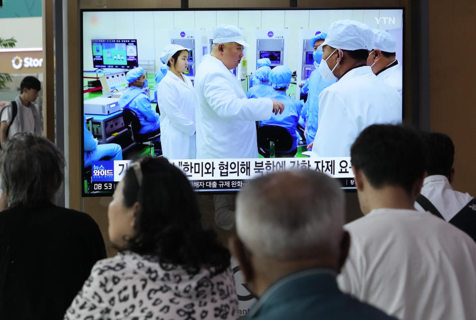 A TV screen shows a file image of North Korean leader Kim Jong Un, third from left, in Seoul, South Korea, on Monday, May 29, 2023.<span class="copyright">Ahn Young-joon—AP Photo</span>
