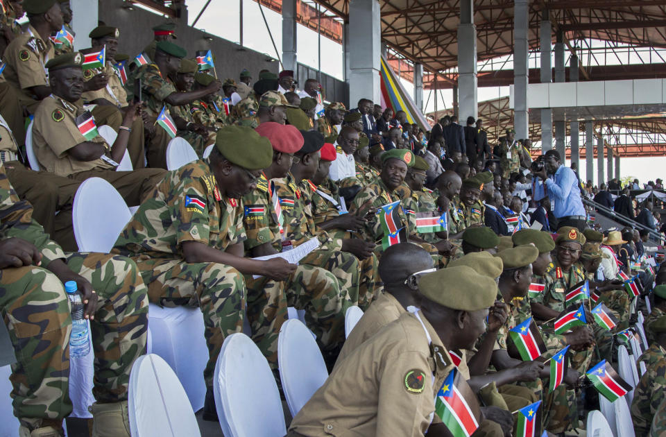 South Sudanese security forces attend peace celebrations in the capital Juba, South Sudan Wednesday, Oct. 31, 2018. For the first time since fleeing South Sudan more than two years ago, opposition leader Riek Machar returned on Wednesday to take part in a nationwide peace celebration. (AP Photo/Bullen Chol)