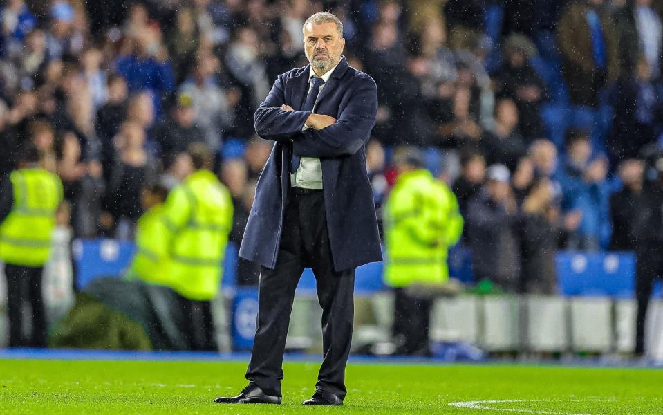 Ange Postecoglou stands on pitch at full time