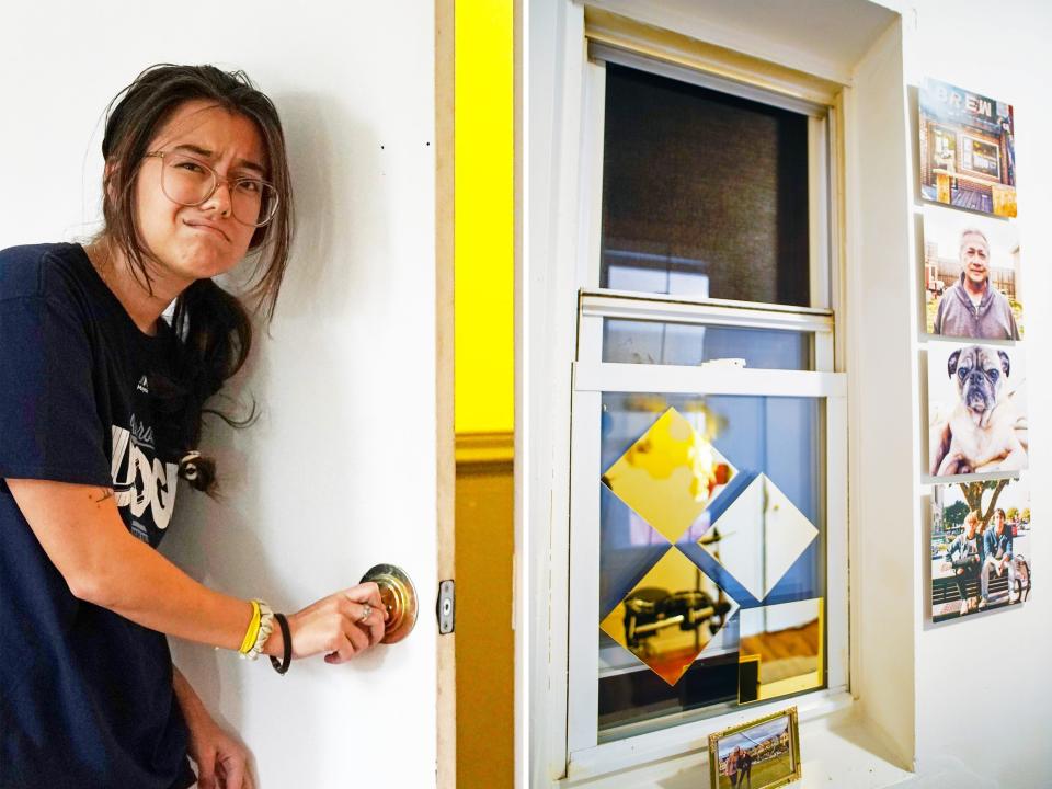 Left: The author opens the mysterious exit from her bedroom. Right: A close-up of one of the windows to nowhere