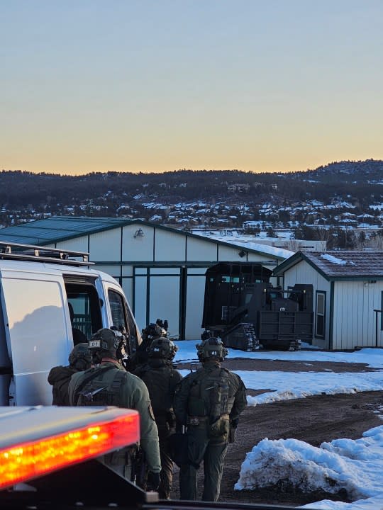 Douglas County SWAT officers respond to a scene to take multiple suspects into custody on March 19, 2024.