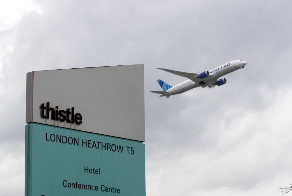 A plane passes over the Thistle Hotel at Heathrow. Prime Minister Boris Johnson is expected to approve plans to force some travellers arriving to the UK to quarantine in hotels to limit the spread of new coronavirus variants. Picture date: Tuesday January 26, 2021.