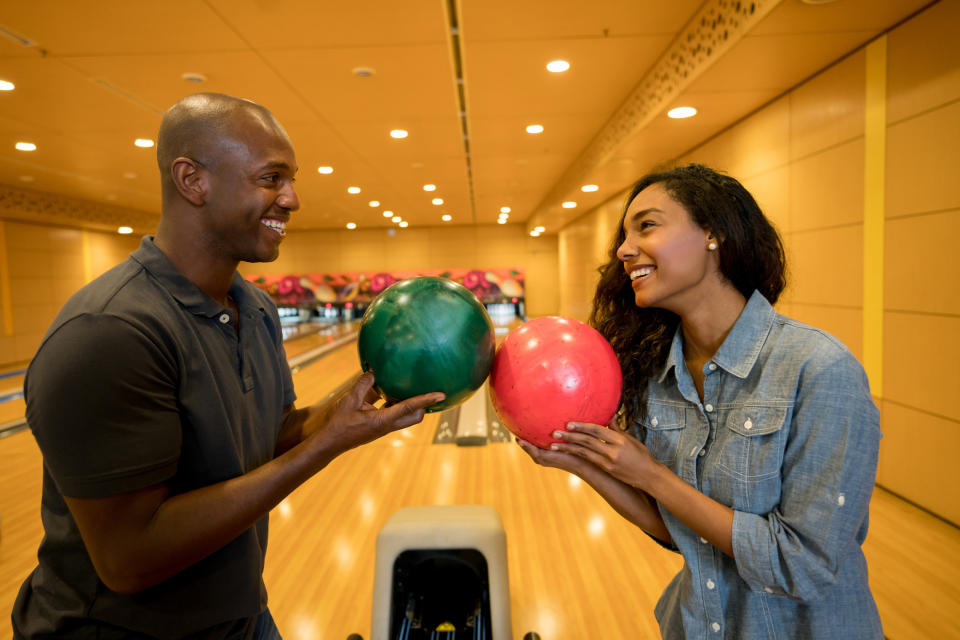 Young couple bowling