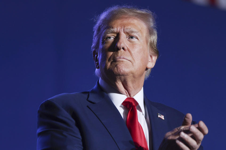 FILE - Former President Donald Trump speaks at a campaign rally, Saturday, Dec. 16, 2023, in Durham, N.H. Trump is facing criticism for repeatedly harnessing rhetoric once used by Adolf Hitler to argue that immigrants entering the U.S. illegally are “poisoning the blood of our country. Trump insists he had no idea that one of the world’s most reviled and infamous figures once used similar words. (AP Photo/Reba Saldanha, File)