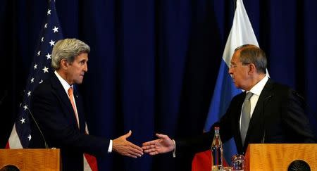 U.S. Secretary of State John Kerry and Russian Foreign Minister Sergei Lavrov (R) shake hands at the conclusion of their news conference following their meeting in Geneva, Switzerland where they discussed the crisis in Syria September 9, 2016. REUTERS/Kevin Lamarque