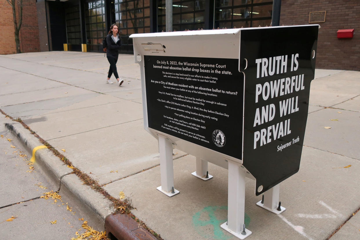 A former absentee ballot drop box has been transformed into an art piece. (Scott Bauer / AP file)