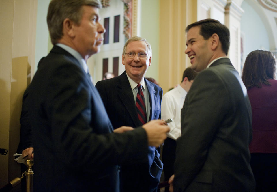 Sen. Roy Blunt (R-Mo.), McConnell, and Sen. Marco Rubio (R-Fla.), share a laugh during news conference in the Capitol after a meeting of Senate Republicans, Feb. 8, 2012. (Photo By Tom Williams/CQ Roll Call)