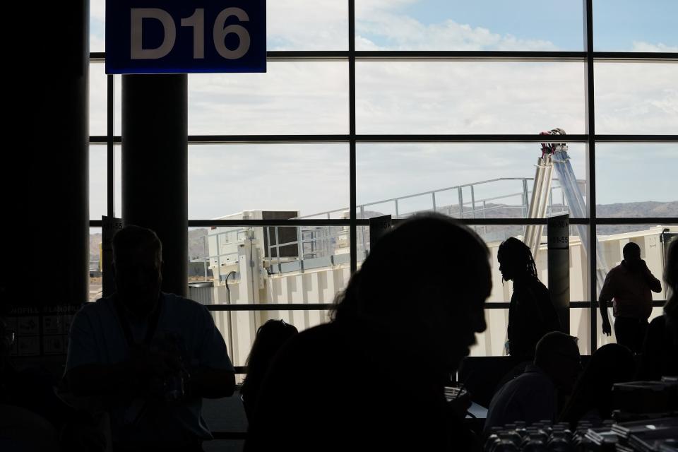 People walk around the new Southwest Airlines concourse at Sky Harbor International Airport on Friday, June 17, 2022, in Phoenix.