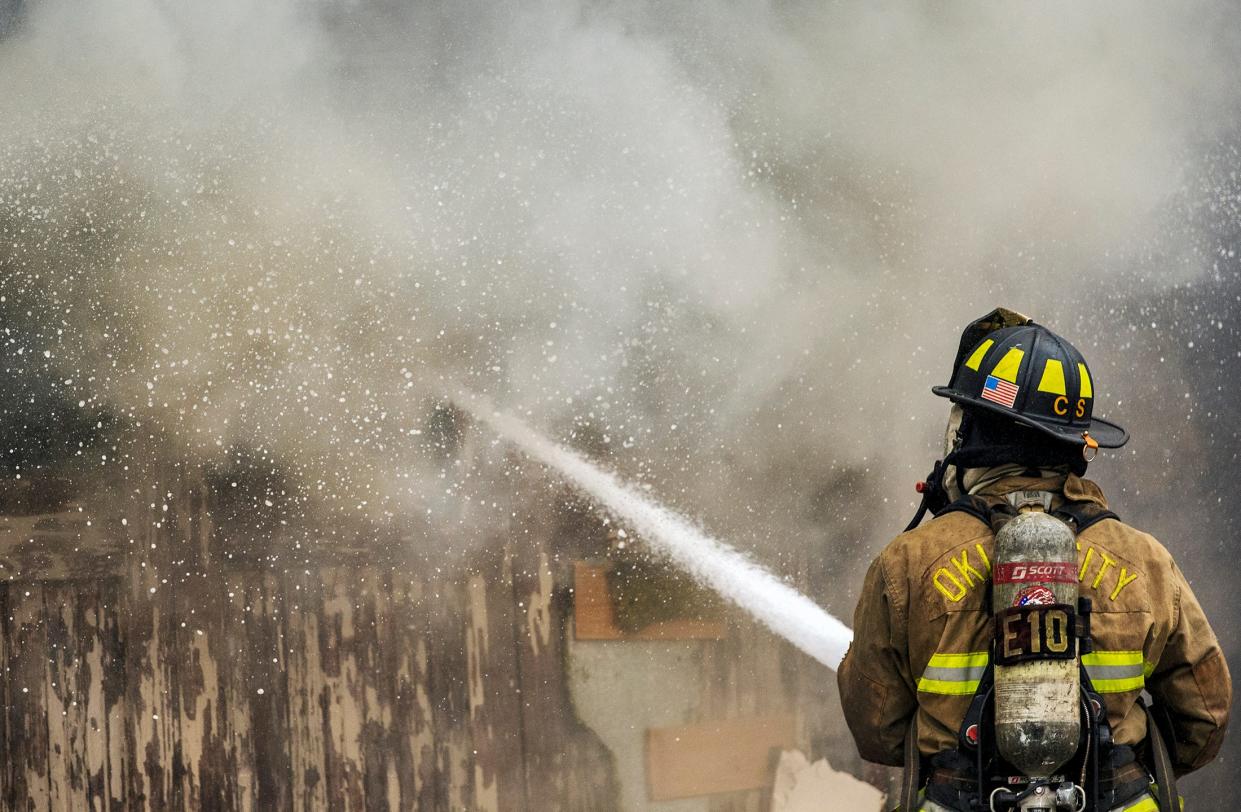 The Oklahoma City Fire Department battles a house fire in Oklahoma City on March 29, 2019. Oklahoma County issued a 14-day burn ban on Tuesday due to high fire risks.