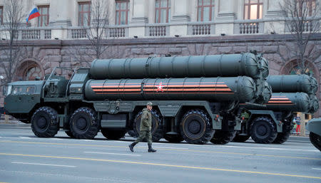 FILE PHOTO - A Russian serviceman walks past S-400 missile air defence systems in Tverskaya Street before a rehearsal for the Victory Day parade, which marks the anniversary of the victory over Nazi Germany in World War Two, in central Moscow, Russia April 29, 2019. REUTERS/Tatyana Makeyeva