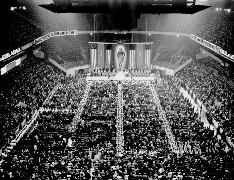 Nazi storm troopers fill the aisles of Madison Square Garden as the crowd sings “The Star Spangled Banner” at the opening of the German-American Bund’s Americanization Rally on Feb. 20, 1939. (Photo: Larry Froeber/NY Daily News Archive via Getty Images)