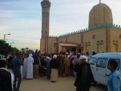 <p>People gather at the site of the Egypt Sinai mosque bombing in Al-Arish, Egypt on Nov. 24, 2017. (Photo: Stringer/Anadolu Agency/Getty Images) </p>