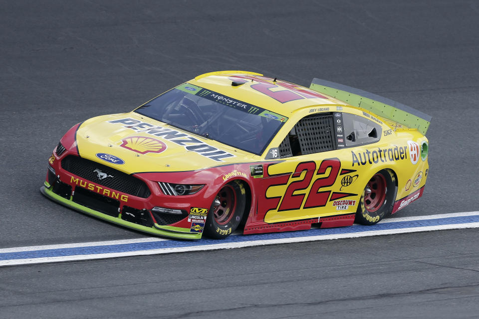 Joey Logano drives through Turn 4 during the NASCAR Cup Series auto race at Charlotte Motor Speedway in Concord, N.C., Sunday, Sept. 29, 2019. (AP Photo/Gerry Broome)