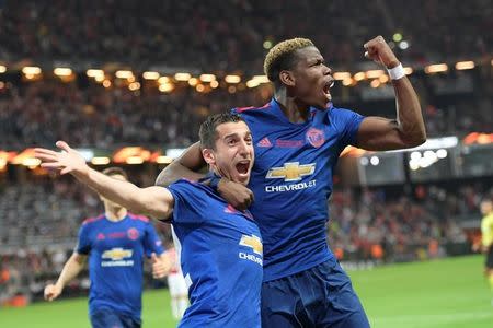 Football Soccer - Ajax Amsterdam v Manchester United - UEFA Europa League Final - Friends Arena, Solna, Stockholm, Sweden - 24/5/17 Henrikh Mkhitaryan (L) of Manchester United celebrates a goal with teammate Paul Pogba. Anders Wiklund/TT NEWS AGENCY/via REUTERS