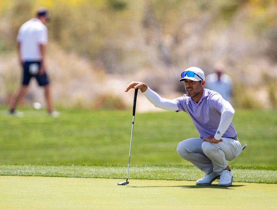 Blake Schmitt of Palm Desert lines up his putt on the third green during a U.S. Open qualifying tournament on the South Course at Ironwood Country Club in Palm Desert, Calif., Tuesday, May 9, 2023. 