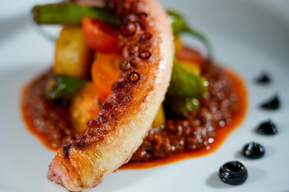 Seared octopus, an appetizer at Bavette in the Third Ward, is served with chorizo vinaigrette, saffron potatoes, shishito pepper and squid ink aioli.