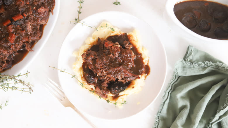 herb and fig pot roast over mashed potato