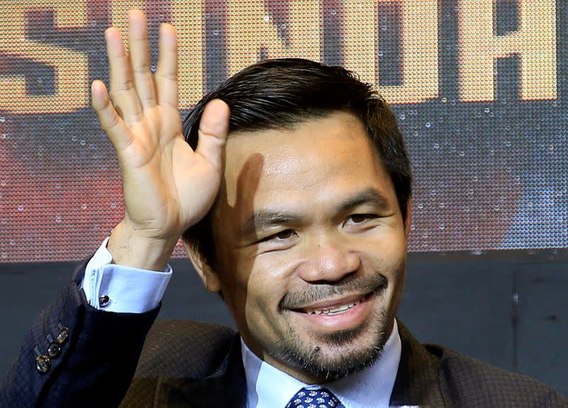 FILE PHOTO: Pacquiao and Matthysse attend a news conference for their upcoming WBA "regular" welterweight title fight, in Paranaque city, metro Manila