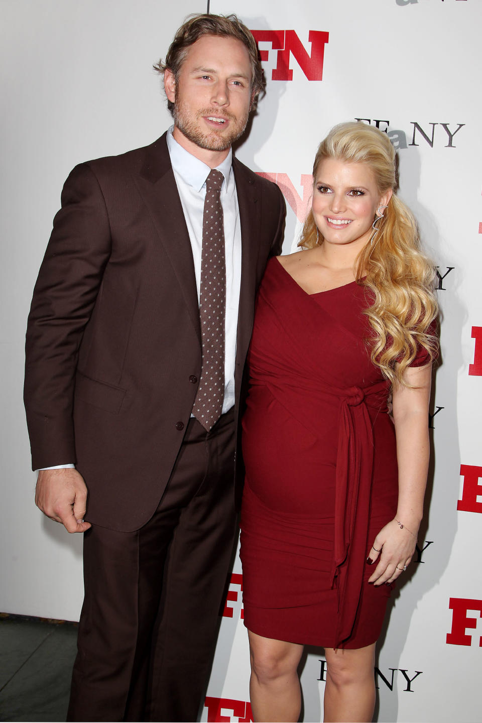 FILE - In this Nov. 29, 2011 file photo, singer Jessica Simpson, right, poses with Eric Johnson at the 25th Annual Footwear News Achievement Awards at The Museum of Modern Art in New York. Simpson's rep confirmed that the entertainer gave birth to Ace Knute in Los Angeles on Sunday, June 30, 2013, via planned C-section. This is the second child for Simpson and her fiance, Eric Johnson. Simpson gave birth to daughter Maxwell last year. (AP Photo/Starpix, Amanda Schwab, file)