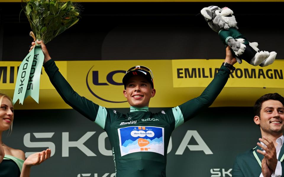 Van Den Broek celebrates as the green jersey winner