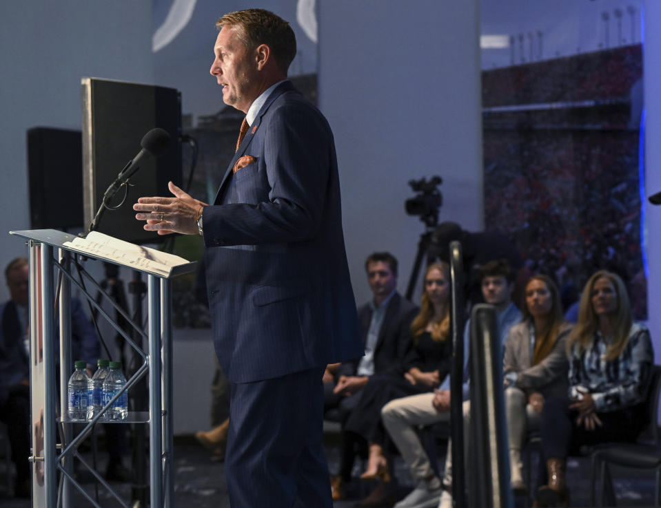 Newly named Auburn football coach Hugh Freeze talks after being introduced at a news conference Tuesday, Nov. 29, 2022, in Auburn, Ala. (AP Photo/Todd Van Emst)