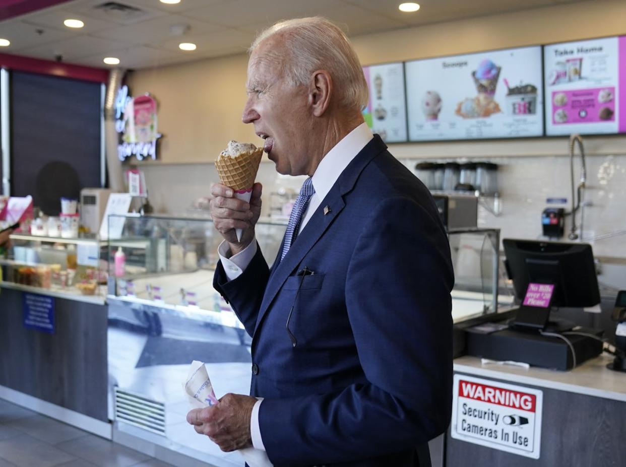 President Joe Biden eats an ice cream cone at a Baskin-Robbins in Portland, Ore., in October 2022. <a href="https://newsroom.ap.org/detail/Biden/c0b94faf3c4243ca812030a8476234a2/photo?Query=Biden%20ice%20cream&mediaType=photo&sortBy=arrivaldatetime:desc&dateRange=Anytime&totalCount=123&currentItemNo=14" rel="nofollow noopener" target="_blank" data-ylk="slk:Carolyn Kaster/AP;elm:context_link;itc:0;sec:content-canvas" class="link ">Carolyn Kaster/AP </a>