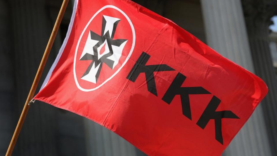 According to Deadline Detroit, JeDonna Matthews Dinges looked through her side window Monday in Grosse Point Park and faced a Ku Klux Klan flag hanging in her neighbor’s side window. (Photo by John Moore/Getty Images)