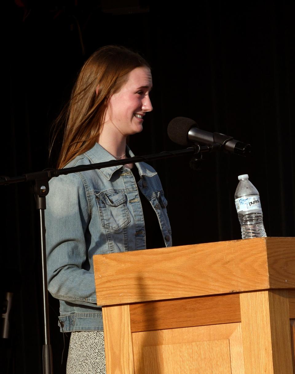 Sophomore Addi Hudson addresses the audience during the groundbreaking ceremony April 20 at Triway High School