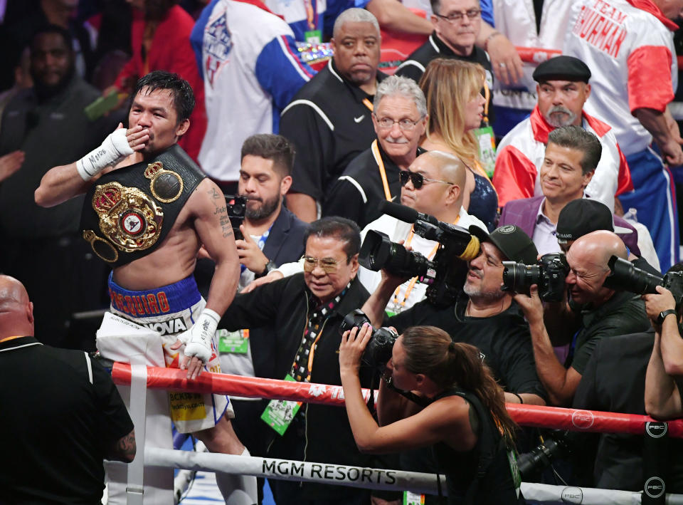 LAS VEGAS, NEVADA - JULY 20:  Manny Pacquiao blows a kiss to the crowd as he celebrates his split-decision victory over Keith Thurman in their WBA welterweight title fight at MGM Grand Garden Arena on July 20, 2019 in Las Vegas, Nevada.  (Photo by Ethan Miller/Getty Images)