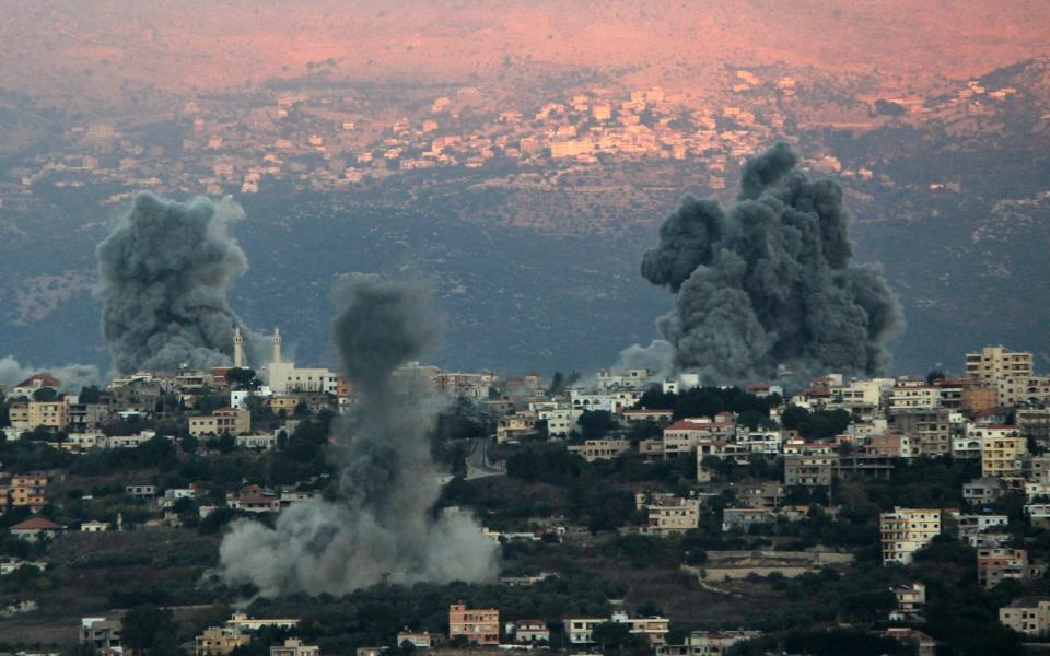 Smoke from an Israeli air strike billows from the southern Lebanese border town of Khiam