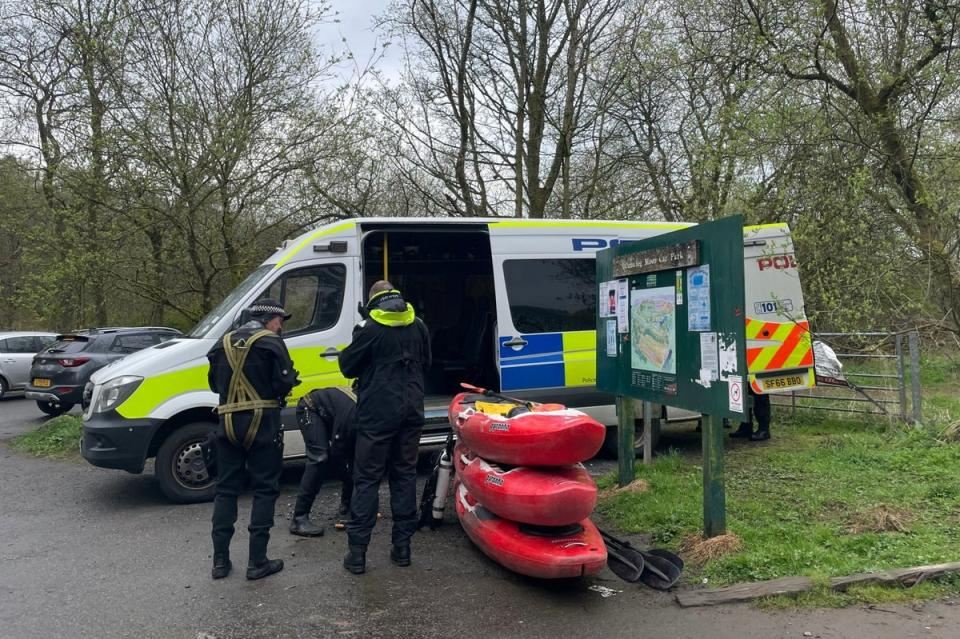 Police divers at the scene at Mugdock Country Park, during the search for Mr Yates (Lucinda Cameron/PA Wire)