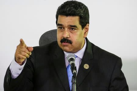 Venezuela's President Nicolas Maduro talks to the media during a news conference after the 17th Non-Aligned Summit in Porlamar, Venezuela September 18, 2016. REUTERS/Marco Bello