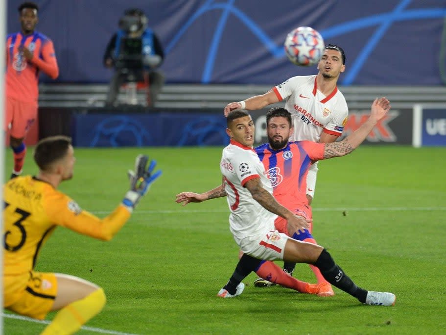 <p>Olivier Giroud scores a goal past Alfonso Pastor</p>AFP