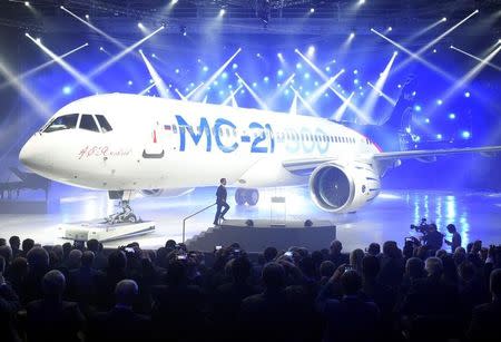 Russian Prime Minister Dmitry Medvedev attends a ceremony to present the Irkut MC-21 mid-range jet airliner at the Irkutsk Aviation Plant (Irkut Corporation) in Irkutsk, June 8, 2016. Sputnik/Alexander Astafyev/Pool/via REUTERS