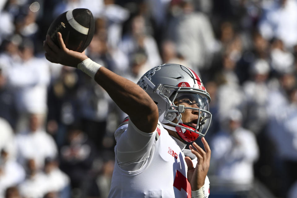 Ohio State quarterback C.J. Stroud (7) throws a pass against Penn State during the first half of an NCAA college football game, Saturday, Oct. 29, 2022, in State College, Pa. (AP Photo/Barry Reeger)